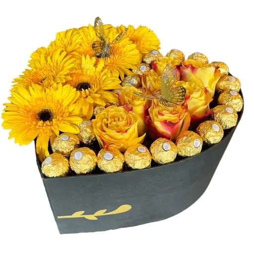 Caja corazon con rosas importadas gerberas y bombones 